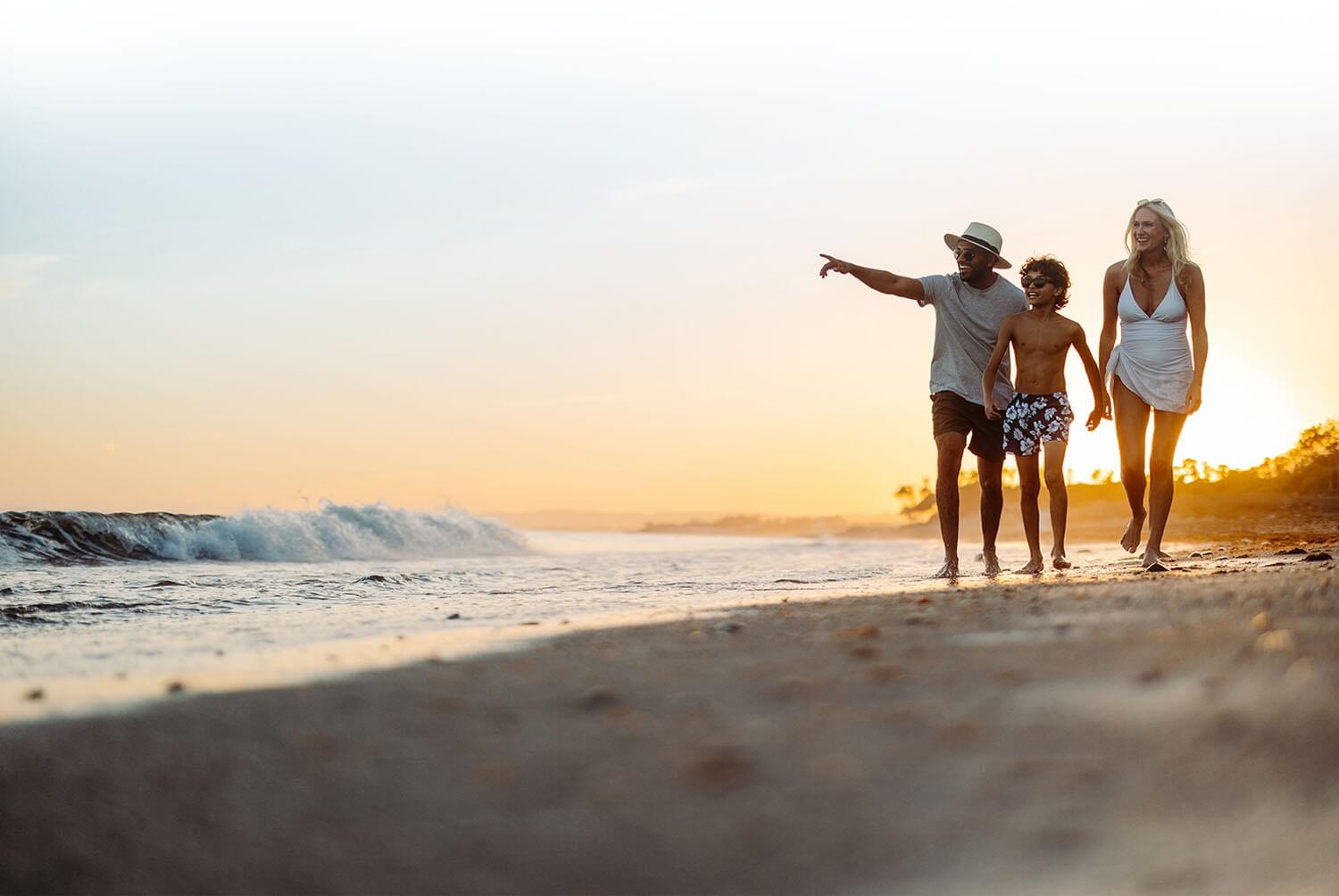 Family walking on the beach